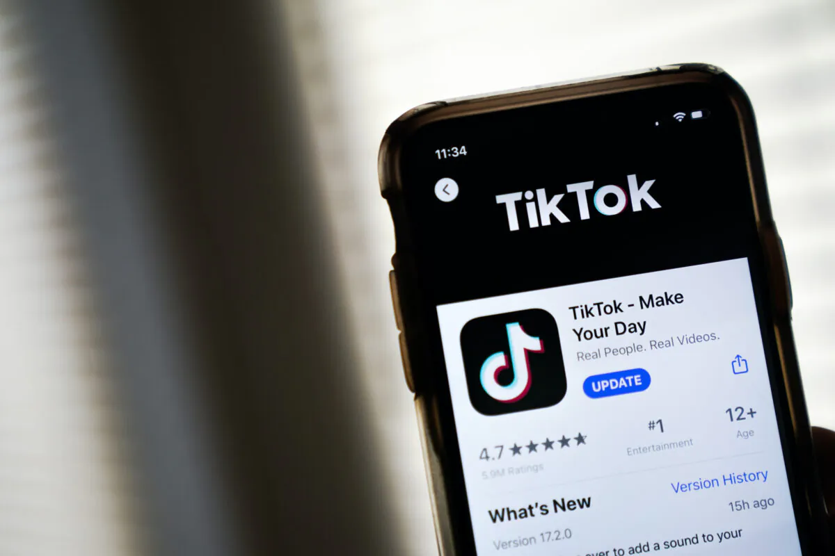 In this photo illustration, the download page for the TikTok app is displayed on an Apple iPhone in Washington on Aug. 7, 2020. (Drew Angerer/Getty Images)