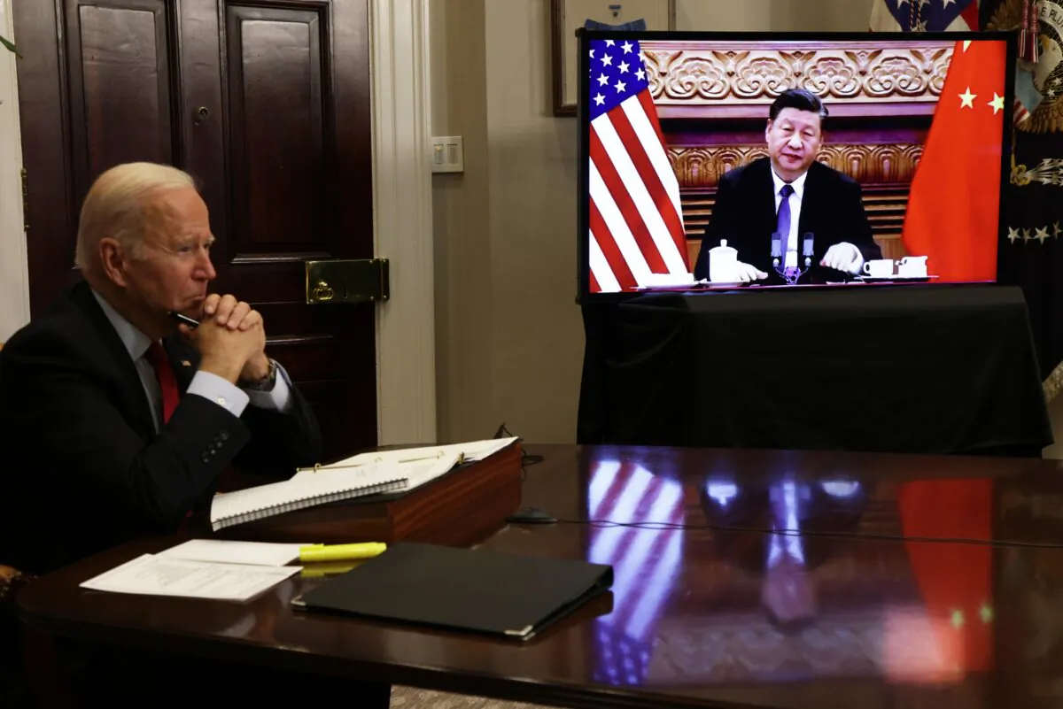U.S. President Joe Biden participates in a video meeting with Chinese leader Xi Jinping on Nov. 15, 2021. (Alex Wong/Getty Images)