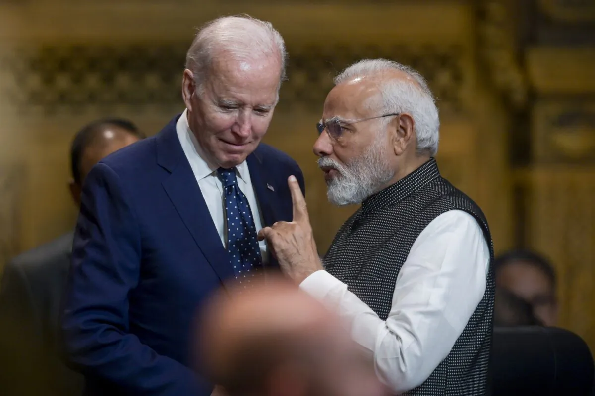 U.S. President Joe Biden, talks with India's Prime Minister Narendra Modi during the G-20 Summit in Nusa Dua, Bali, Indonesia, on Nov. 15, 2022. (Bay Ismoyo/Pool Photo via AP)