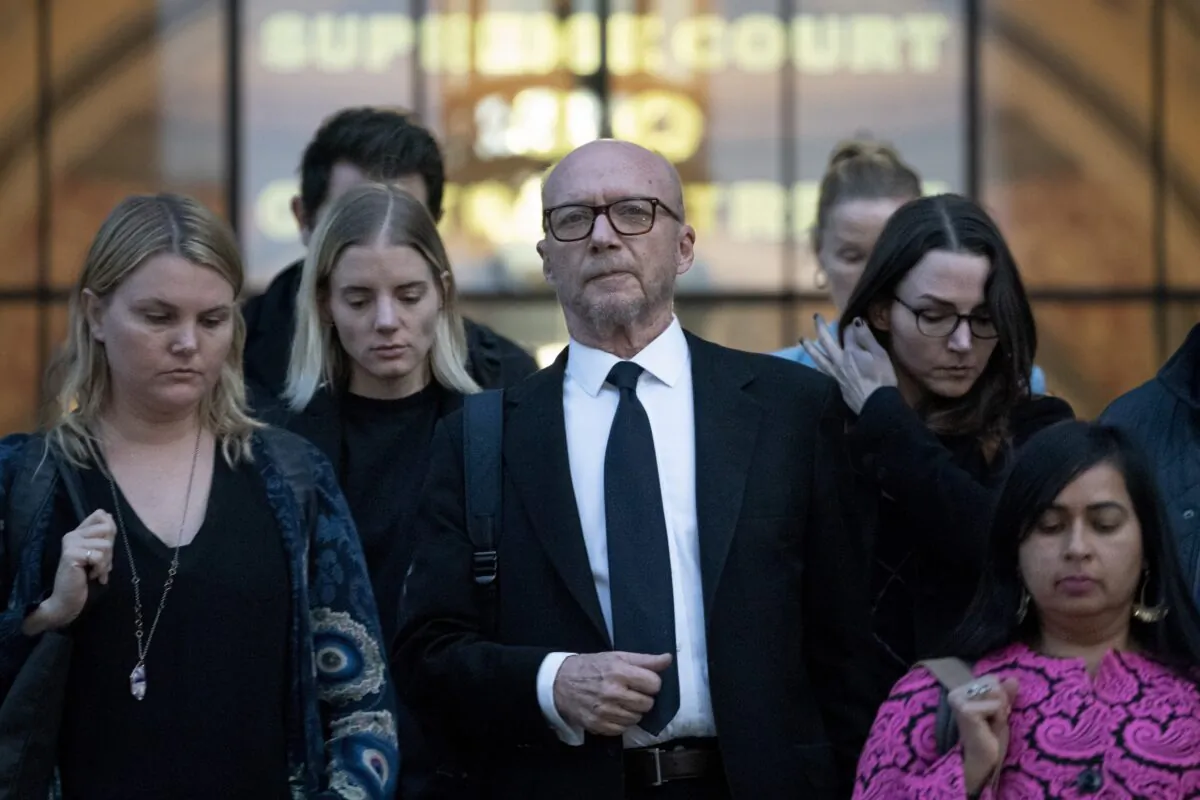Screenwriter and film director Paul Haggis (C) leaves court after being found guilty in a sexual assault civil lawsuit in New York on Nov. 10, 2022. (John Minchillo/AP Photo)