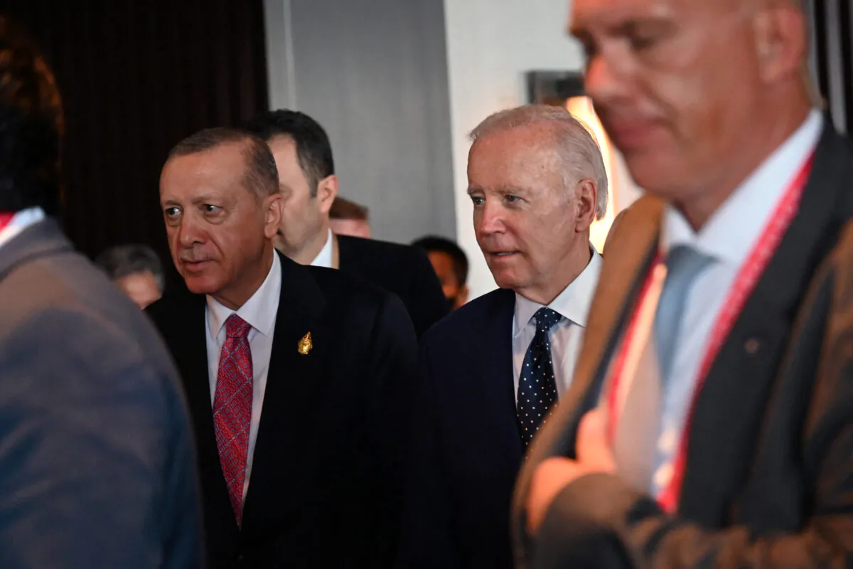 US President Joe Biden (R) walks with Turkey's President Recep Tayyip Erdogan (L) for their bilateral meeting during the G20 summit in Nusa Dua in Bali, Indonesia on Nov. 15, 2022. (Sonny Tumbelaka/Pool/AFP via Getty Images)