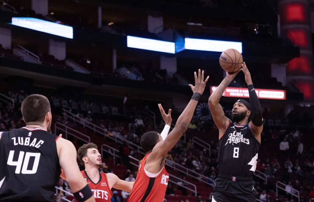 LA Clippers forward Marcus Morris Sr. (8) shoots against Houston Rockets forward Jabari Smith Jr. (1) in the first quarter at Toyota Center in Houston, on Nov 14, 2022. (Thomas Shea/USA TODAY Sports via Field Level Media)