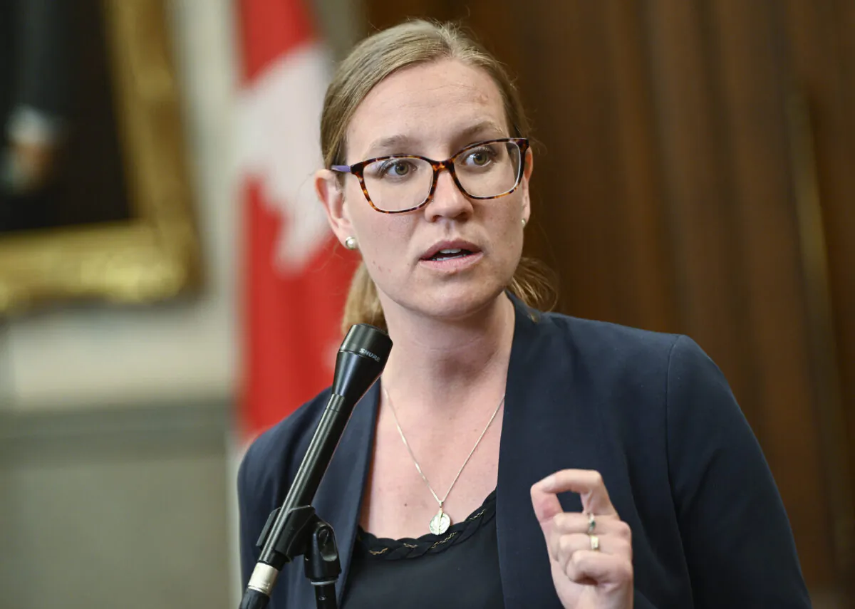 Minister of Families, Children and Social Development Karina Gould speaks to reporters before heading to Question Period in the House of Commons on Parliament Hill in Ottawa on June 23, 2022. (The Canadian Press/Justin Tang)