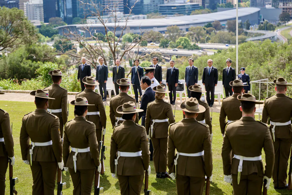 Prime Minister of Japan, Kishida Fumio inspects the honour guard during the Ceremonial Welcome on October 22, 2022 in Perth, Australia. (Photo by Stefan Gosatti/Getty Images)