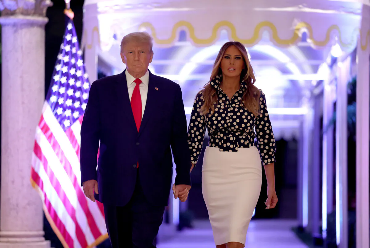 Former U.S. President Donald Trump and former first lady Melania Trump arrive for an event at his Mar-a-Lago home in Palm Beach, Florida, on Nov. 15, 2022. (Joe Raedle/Getty Images)