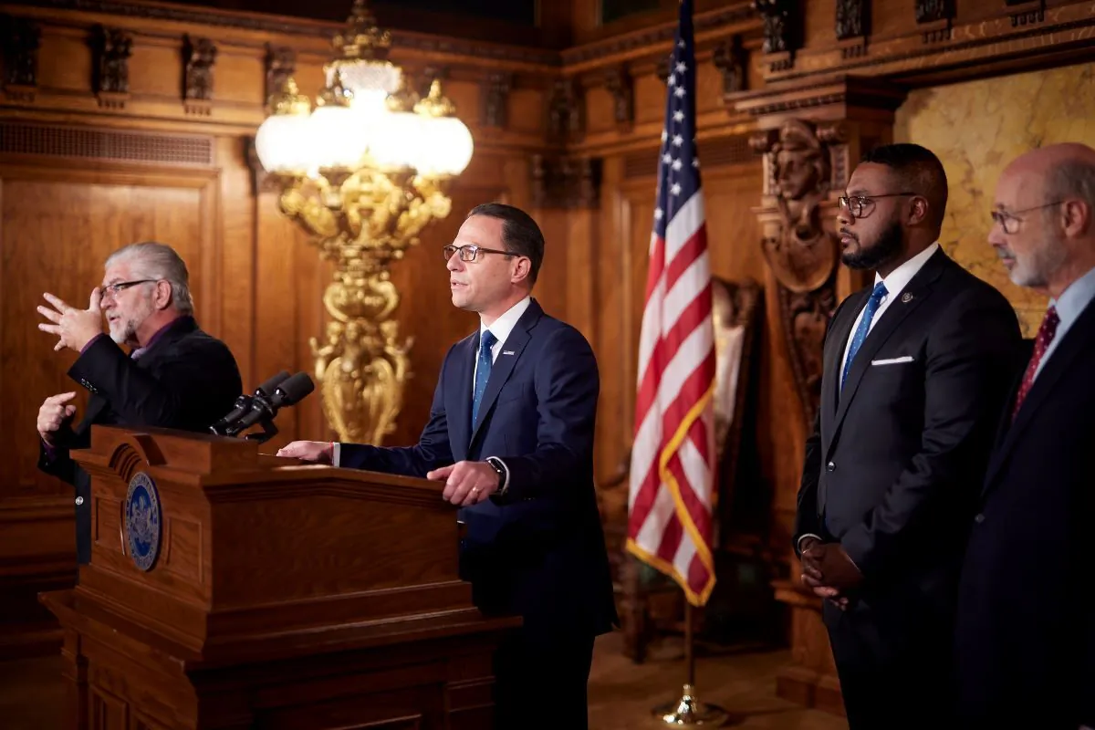 Pennsylvania Governor-elect Josh Shapiro (L) speaks with the press and is joined by Gov. Tom Wolf and Lt. Governor-elect Austin Davis in Harrisburg, Pa., on Nov.16, 2022. (Commonwealth Media Services) 
