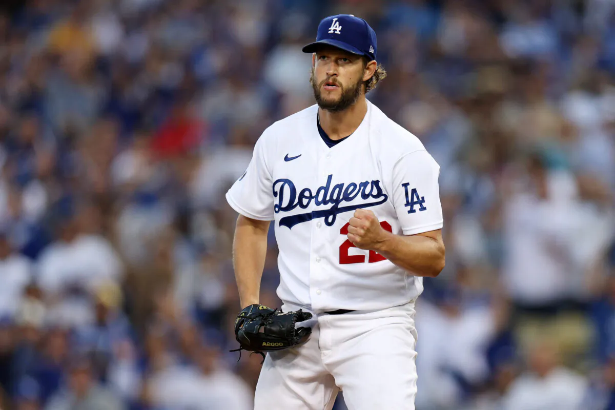 Clayton Kershaw (22) of the Los Angeles Dodgers reacts after striking out Austin Nola (26) of the San Diego Padres to end of the top of the second inning during game two of the National League Division Series at Dodger Stadium in Los Angeles, on Oct. 12, 2022. (Harry How/Getty Images)