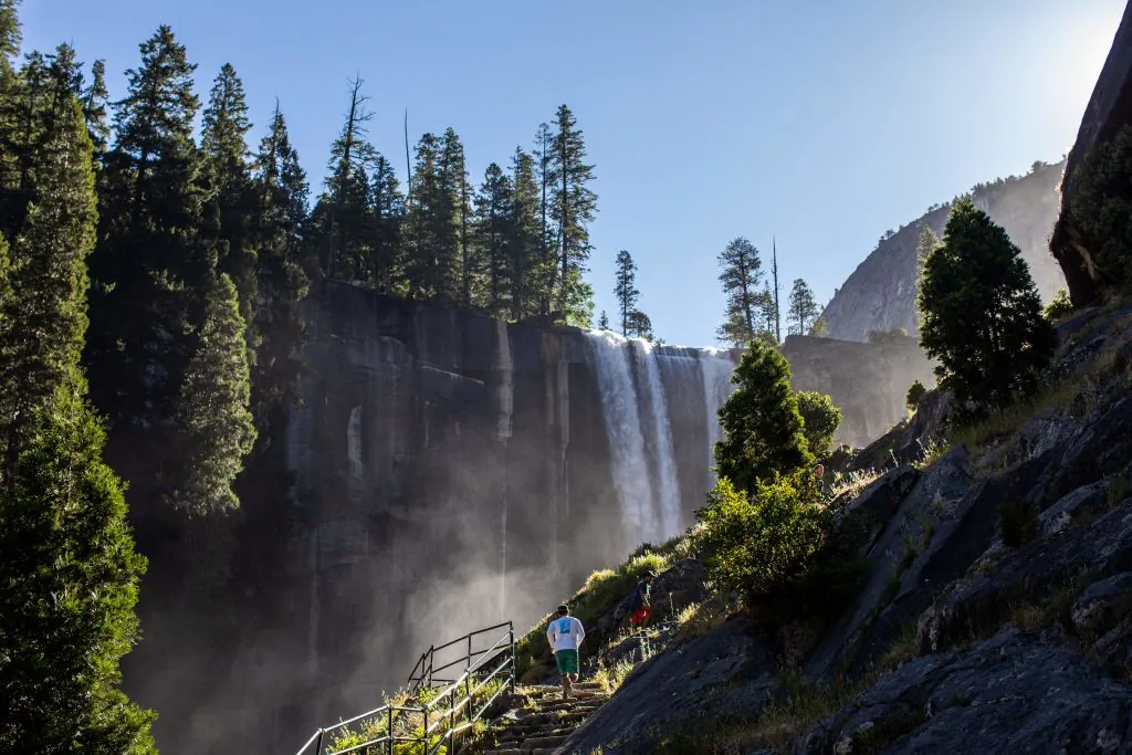 Visitors hike the Mist Trail toward Vernal Fall in the Yosemite National Park, Calif., on July 3, 2020. (Apu Gomes/AFP via Getty Images)
