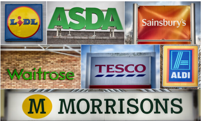 2015 年 11 月 18 日，英国布里斯托尔的各个分店外展示了英国主要超市 Lidl、Asda、Sainsbury's、Waitrose、Tesco、Aldi 和 Morrisons 的标识。（Matt Cardy/Getty Images）