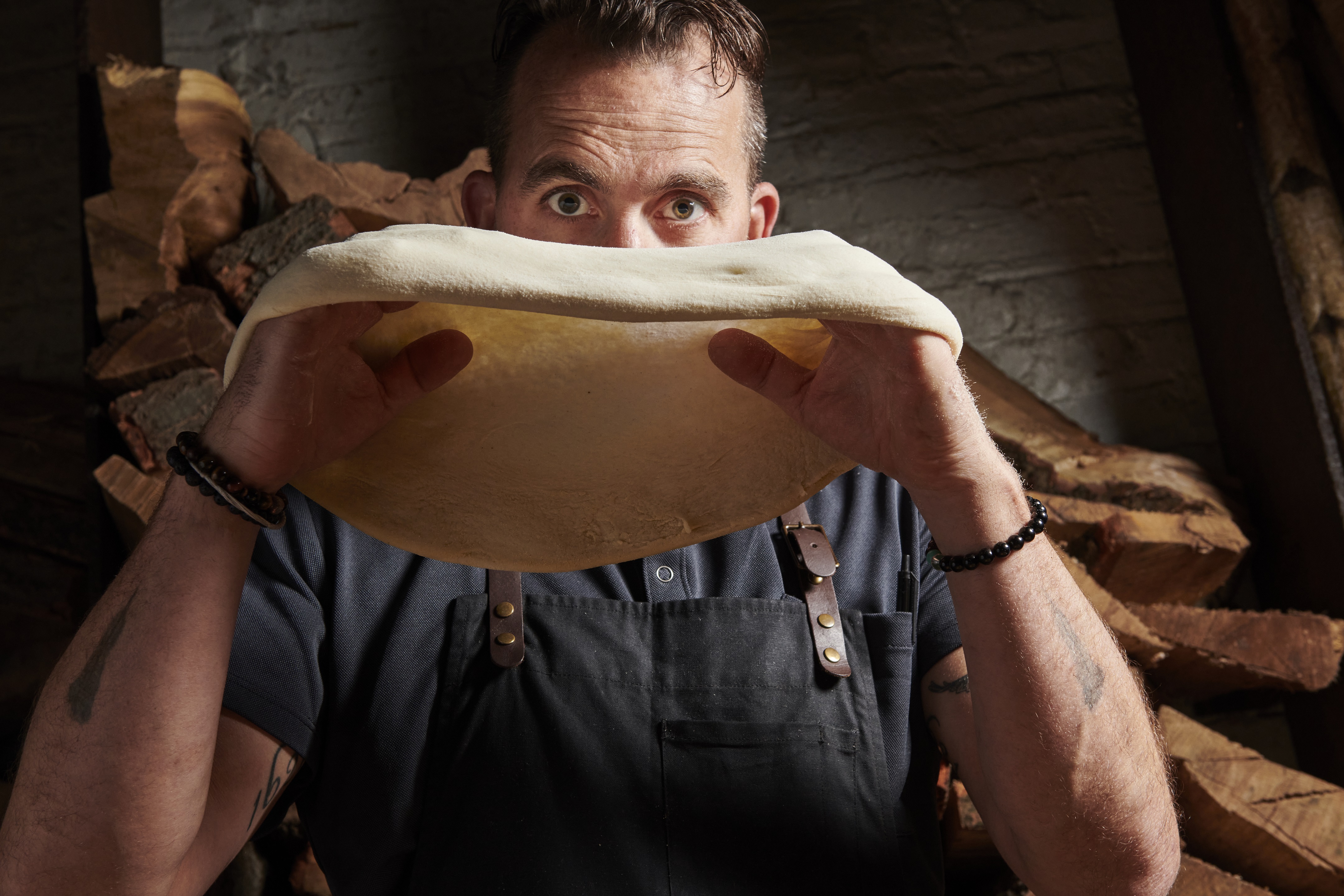 Marc with pizza dough (credit_ Evan Sung)