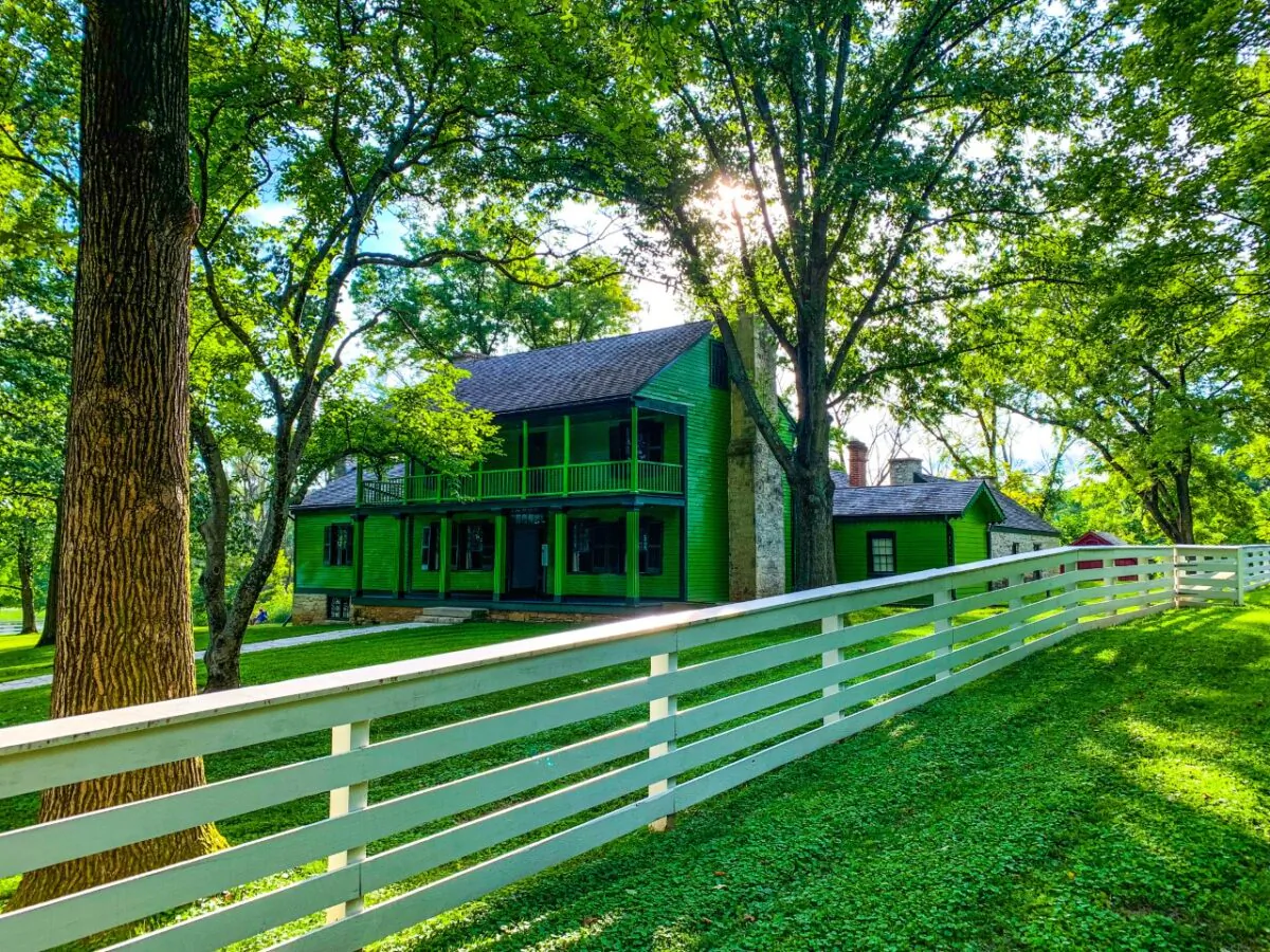 Painted a bright and 19th century fashionable “Paris green” when Julia and Ulysses Grant acquired White Haven after the Civil War ended, the home sports federal style architecture, a spacious upstairs and downstairs porch, and a stone fireplace/chimney. (National Park Service)