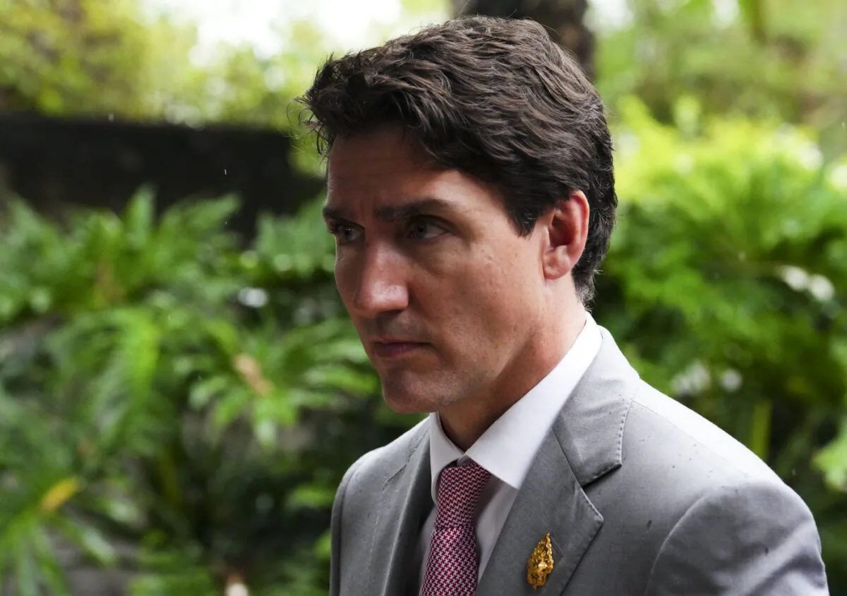 Prime Minister Justin Trudeau makes his way to his vehicle as he leaves the G20 Leaders Summit in Bali, Indonesia, on Nov. 16, 2022. (Sean Kilpatrick/The Canadian Press)