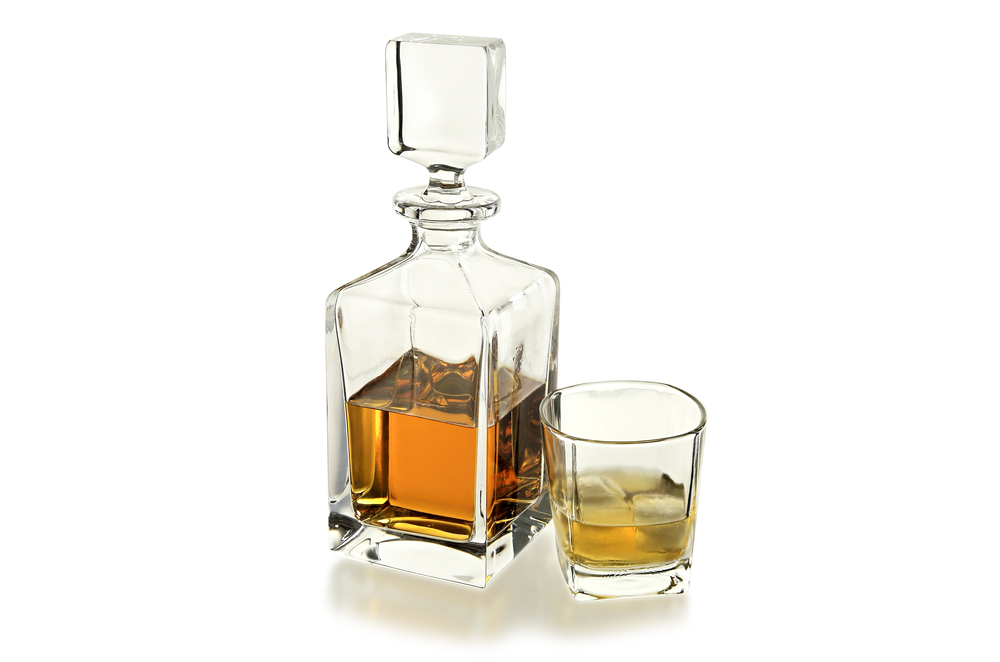 Whiskey,Decanter,And,Glass,Isolated,On,White