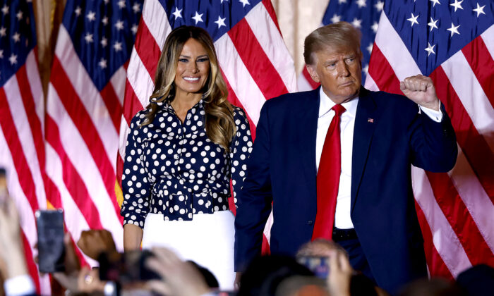 Former U.S. President Donald Trump, joined by former U.S. First Lady Melania Trump, arrives to speak at the Mar-a-Lago Club in Palm Beach, Florida, on Nov. 15, 2022. (Alon Skuy/AFP via Getty Images)