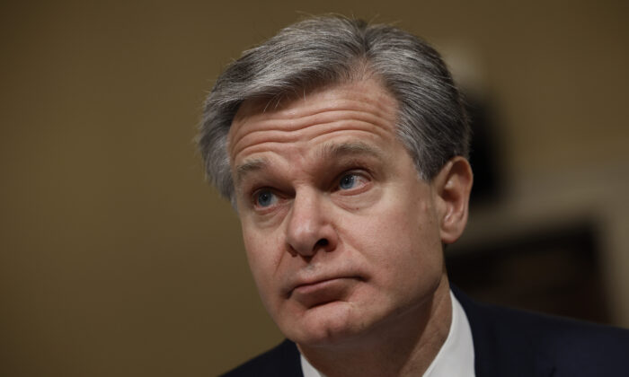 FBI Director Christopher Wray prepares to testify before the House Homeland Security Committee in the Cannon House Office Building on Capitol Hill in Washington on Nov. 15, 2022. (Chip Somodevilla/Getty Images)