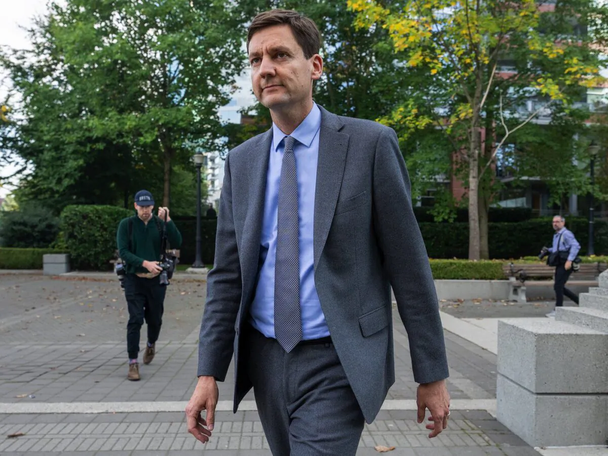 Former B.C. attorney general and housing minister David Eby arrives for a news conference in a park in downtown Vancouver, B.C., Oct. 20, 2022. (The Canadian Press/Jonathan Hayward)
