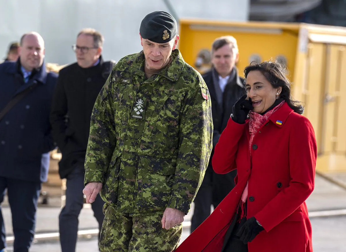 Defence Minister Anita Anand, right, walks with Gen. Wayne Eyre, chief of defence staff, as they attend an announcement in Halifax on Nov.18, 2022. (The Canadian Press/Andrew Vaughan)

