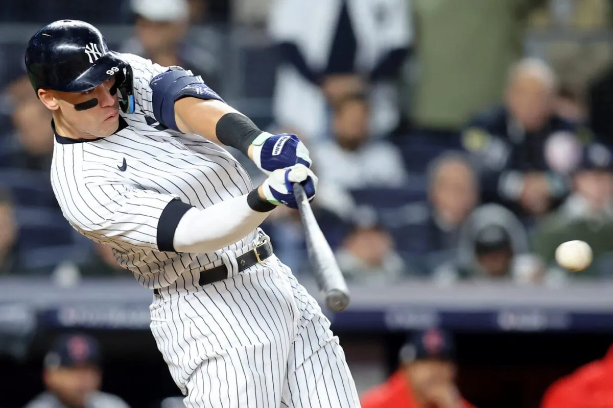 New York Yankees right fielder Aaron Judge (99) hits a single against the Cleveland Guardians during the seventh inning in game five of the ALDS for the 2022 MLB Playoffs at Yankee Stadium, in New York, on Oct. 18, 2022. (Brad Penner/USA TODAY Sports via Field Level Media)
