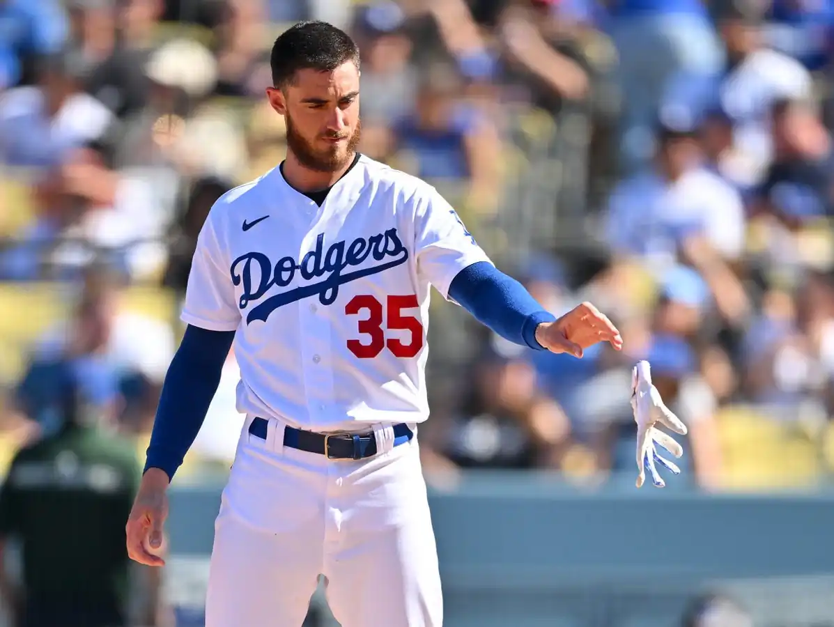 Los Angeles Dodgers center fielder Cody Bellinger (35) tosses his batting gloves after striking out in the fifth inning against the Colorado Rockies at Dodger Stadium, in Los Angeles, on Oct. 2, 2022. (Jayne Kamin-Oncea/USA TODAY Sports via Field Level Media)