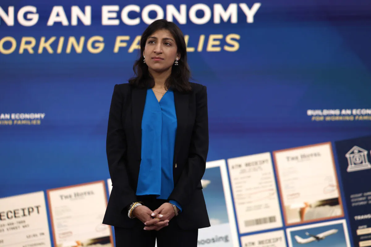 Federal Trade Commission Chair Lina Khan listens as President Joe Biden delivers remarks on the economy in the Eisenhower Executive Office Building in Washington, on Oct. 26, 2022. (Anna Moneymaker/Getty Images)