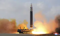 Kim Jong-un Unveils His Daughter During Ballistic Missile Launch