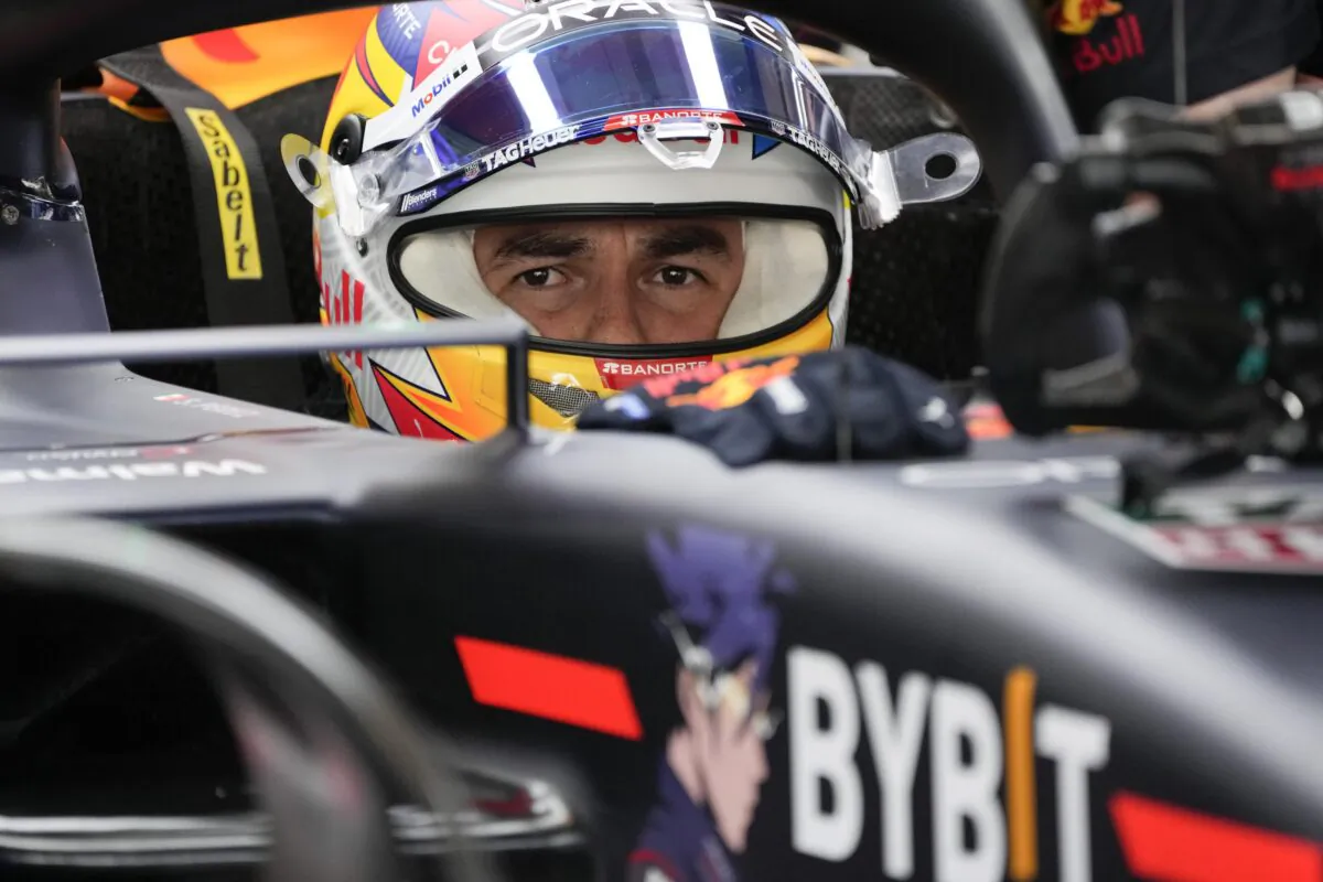 Red Bull driver Sergio Perez of Mexico sits in his car during practice for thethe Formula One Abu Dhabi Grand Prix, in Abu Dhabi, United Arab Emirates, on Nov. 18, 2022. (Hussein Malla/AP Photo)
