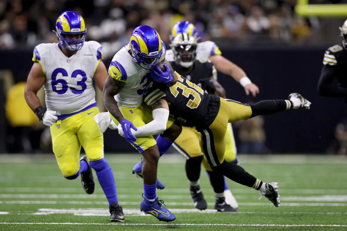 Tyrann Mathieu (32) of the New Orleans Saints tackles Cam Akers (3) of the Los Angeles Rams during the first half at Caesars Superdome in New Orleans, on Nov. 20, 2022. (Sean Gardner/Getty Images)