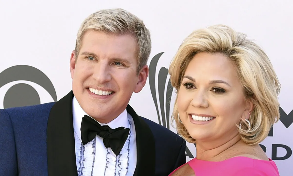 Todd Chrisley (L) and his wife Julie Chrisley pose for photos at the 52nd annual Academy of Country Music Awards in Las Vegas on April 2, 2017. (Jordan Strauss/Invision/AP)