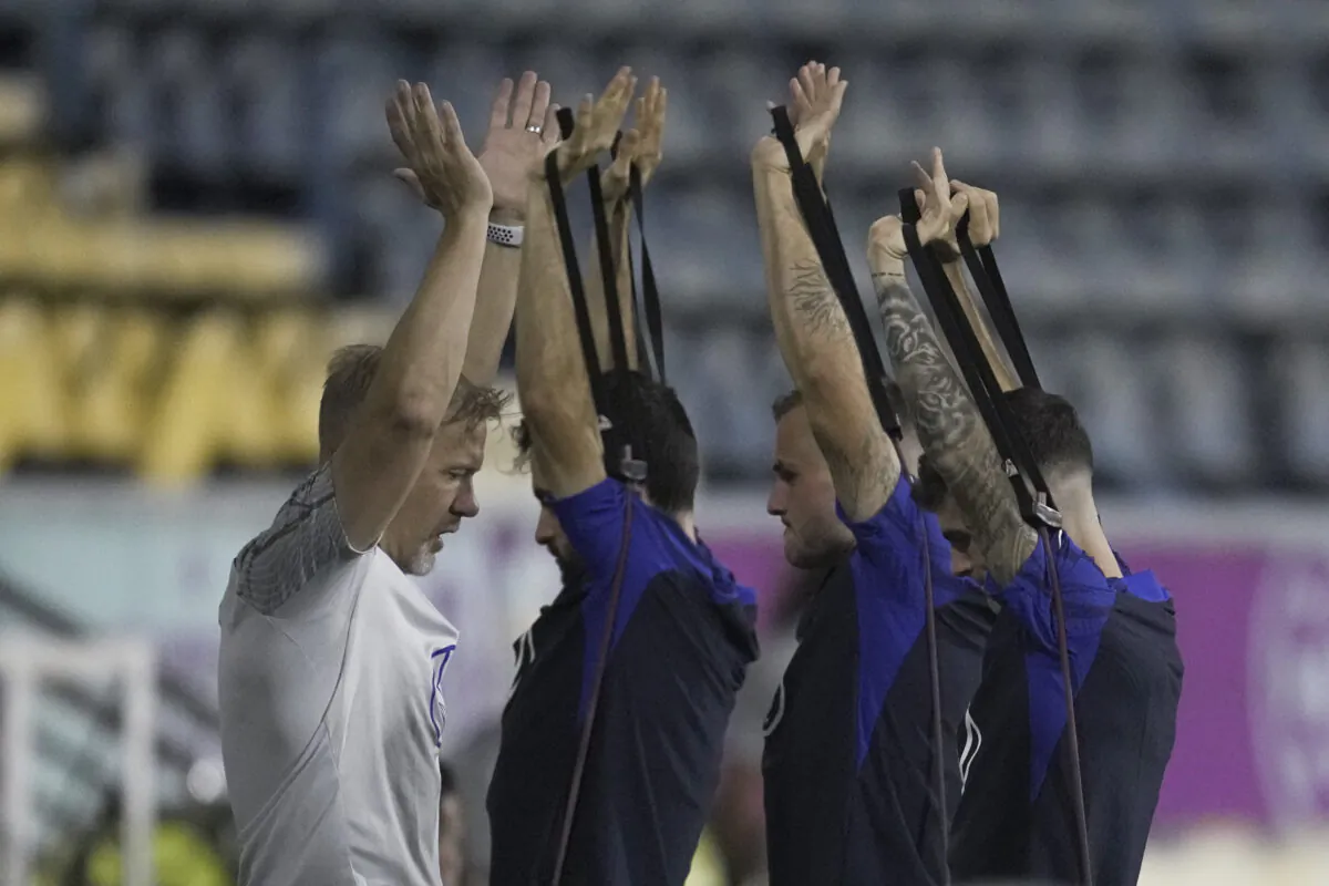 U.S. players participate in an official training session at Al-Gharafa SC Stadium, in Doha, Qatar, on Nov. 19, 2022. (Ashley Landis/AP Photo)