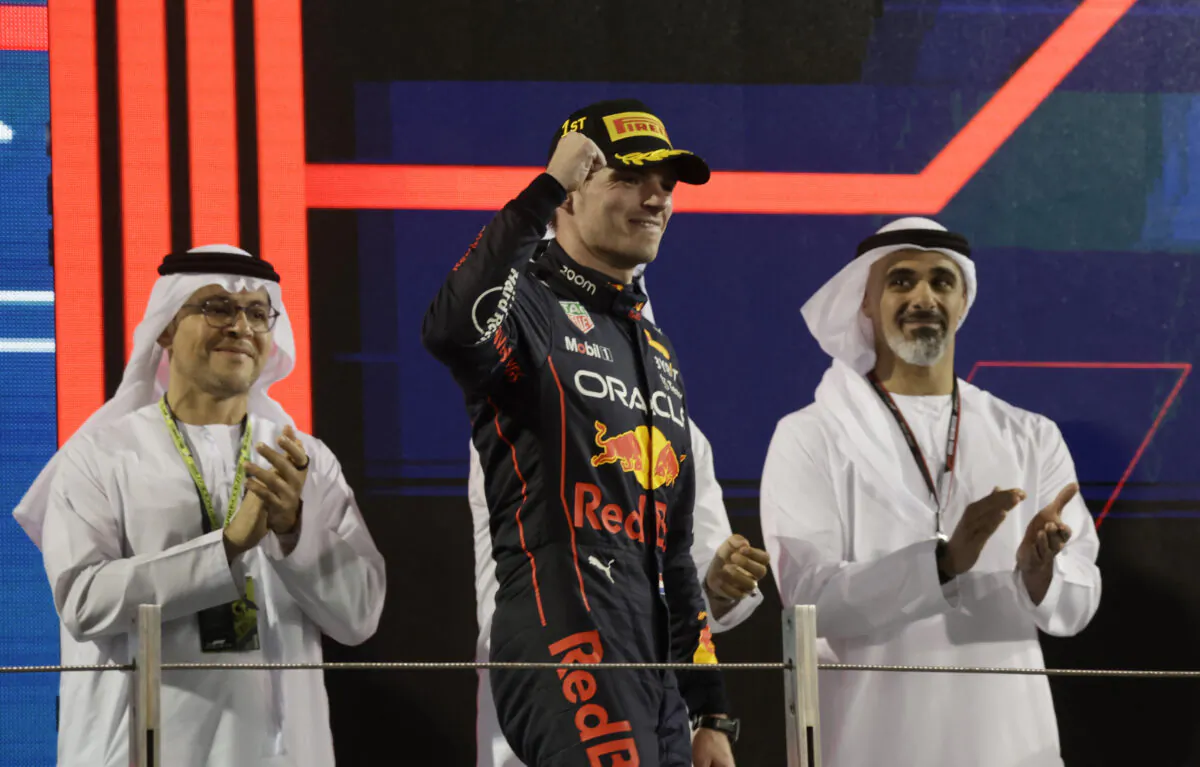 Abu Red Bull's Max Verstappen celebrates on the podium after winning the Abu Dhabi Grand Prix at the Yas Marina Circuit in Abu Dhabi, UAE, on Nov. 22, 2022. (Leonhard Foeger/Reuters)