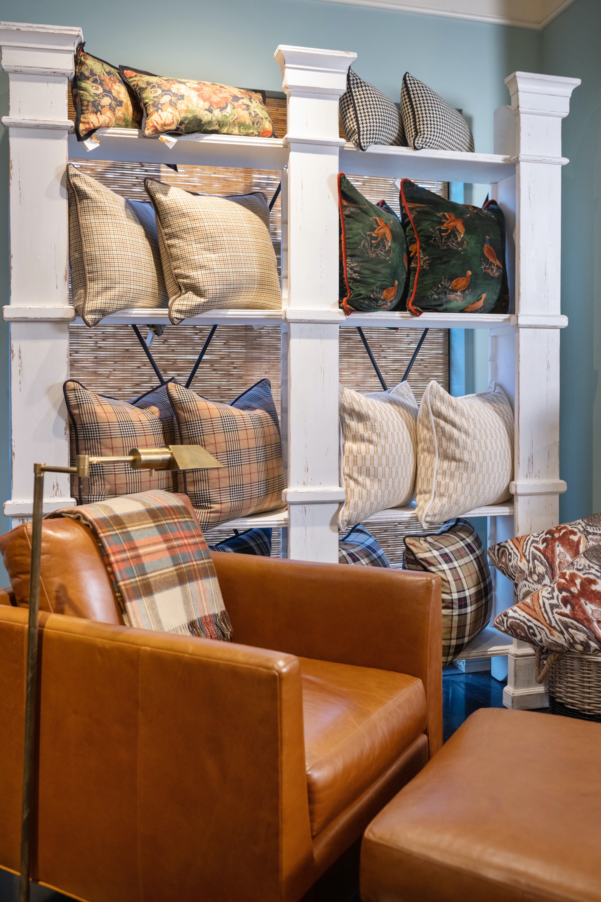 Plaid pillows of various colors and styles