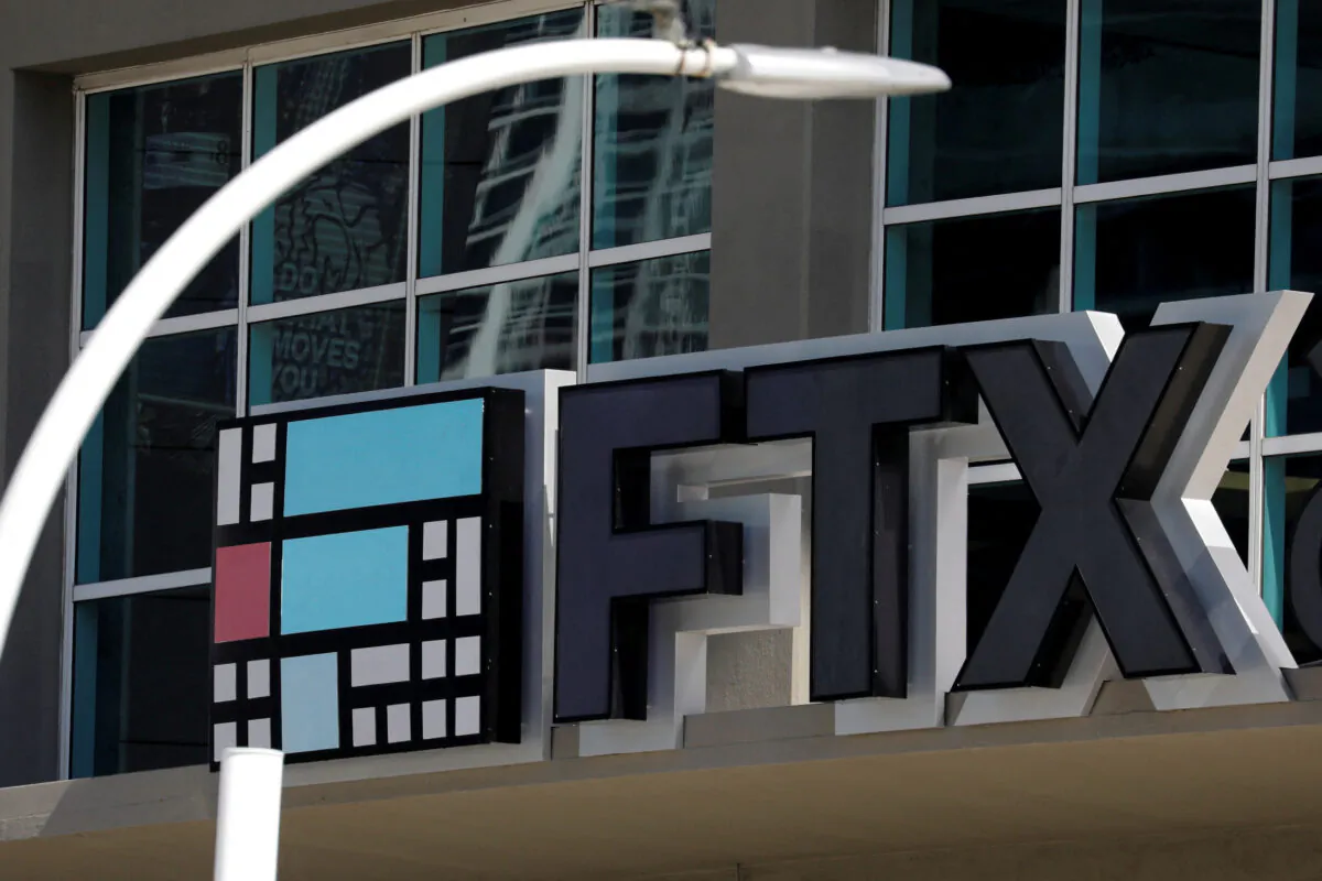 The logo of FTX at the entrance of the FTX Arena in Miami on Nov. 12, 2022. (Marco Bello/Reuters)