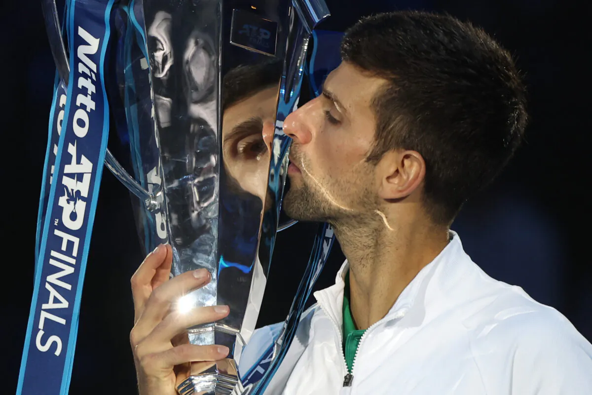 Novak Djokovic of Serbia poses with the trophy after defeating Casper Ruud of Norway during the Final on Day Eight of the Nitto ATP Finals at Pala Alpitour in Turin, Italy, on Nov. 20, 2022. (Matthew Stockman/Getty Images)