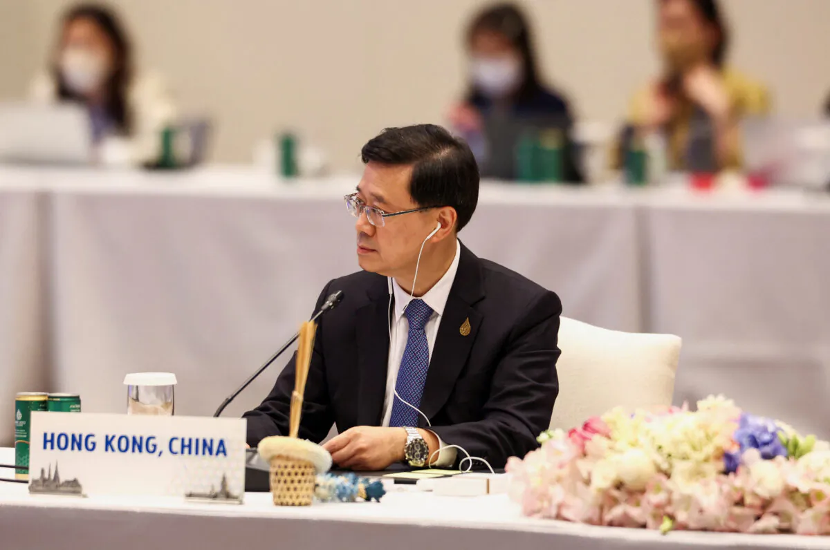 Hong Kong Chief Executive John Lee attends the APEC Leaders' Informal Dialogue with Guests during the Asia-Pacific Economic Cooperation (APEC) Summit 2022, in Bangkok on Nov. 18, 2022. (Athit Perawongmetha/Pool/Reuters)