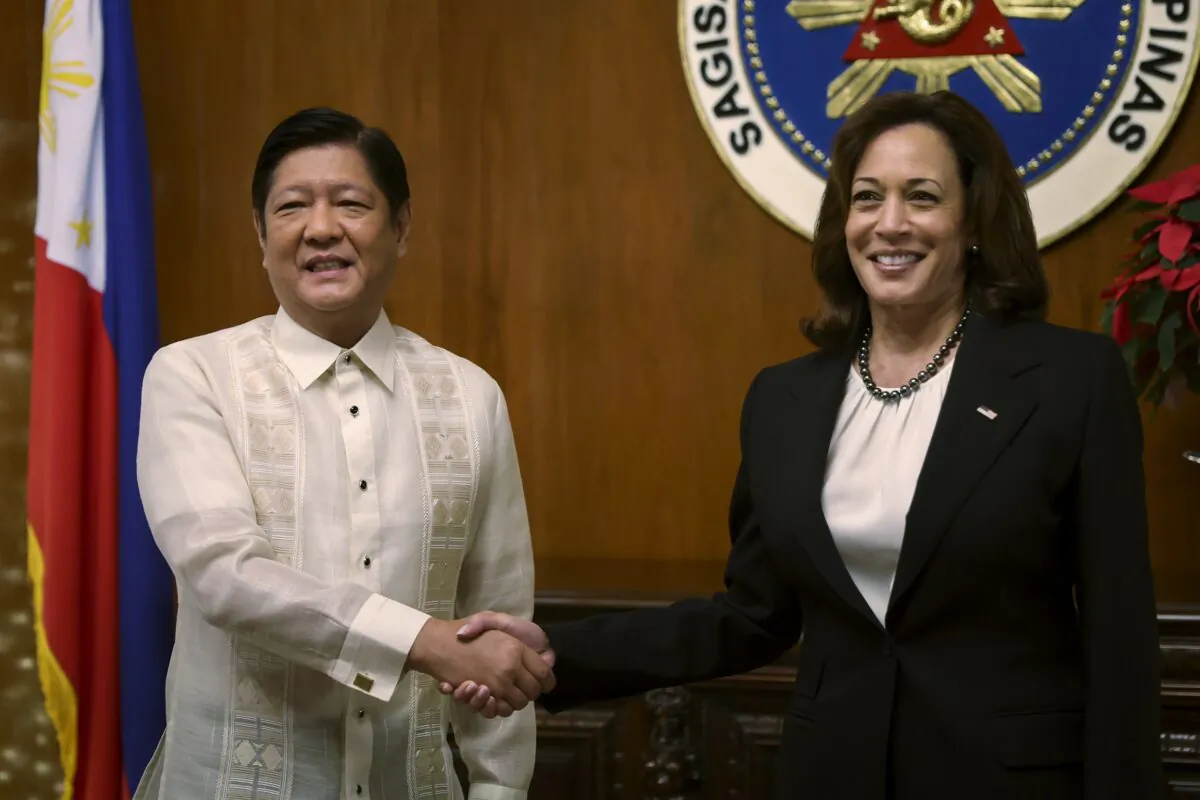 U.S. Vice President Kamala Harris (R) shakes hands with Philippine President Ferdinand Marcos Jr. at the Malacanang presidential palace in Manila, Philippines, on Nov. 21, 2022 (Eloisa Lopez/Pool Photo via AP)