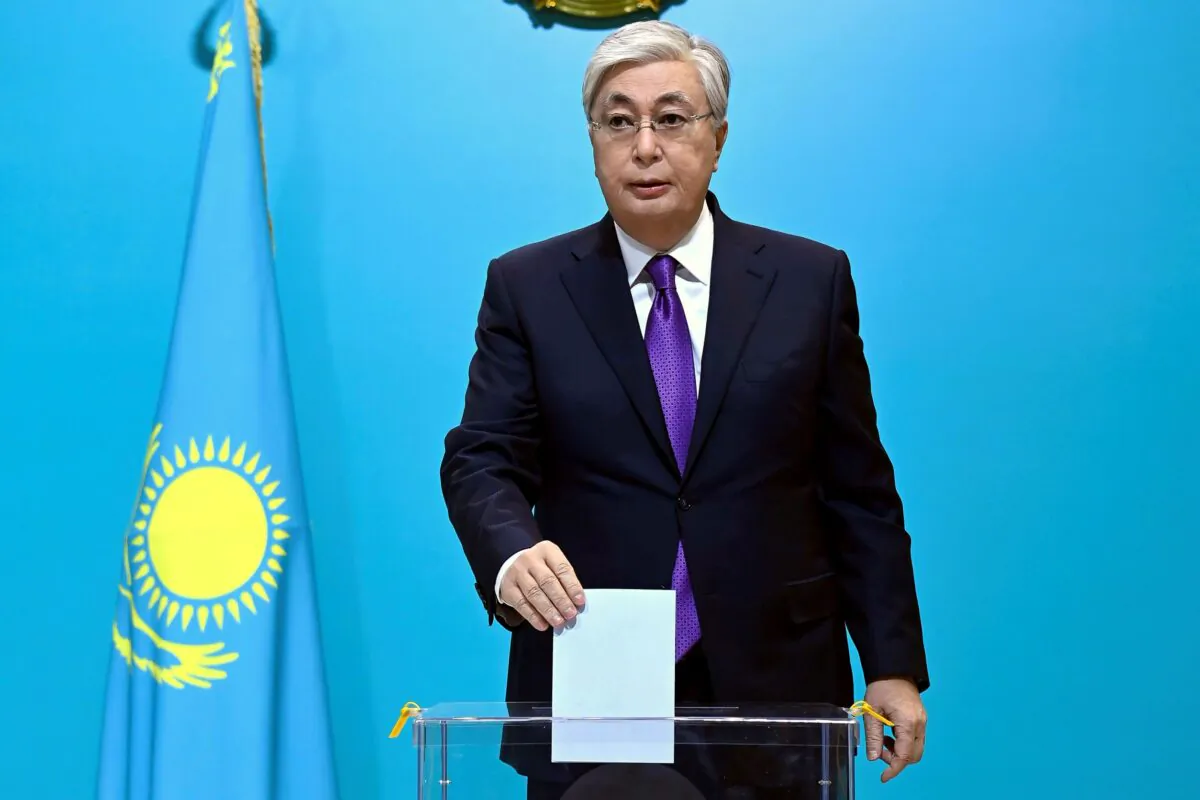 Kazakhstan's President Kassym-Jomart Tokayev casts his ballot at a polling station in Astasna, Kazakhstan on Nov. 20, 2022. (Kazakhstan's President Press Office via AP)