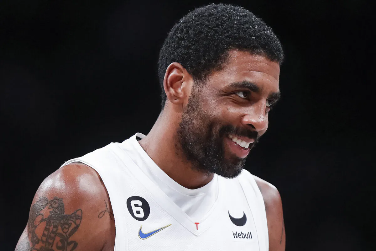 Brooklyn Nets guard Kyrie Irving reacts after scoring against the Memphis Grizzlies during the second half of an NBA basketball game in New York on Nov. 20, 2022. (Eduardo Munoz Alvarez/AP Photo)