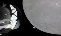 NASA Capsule Buzzes Moon, Last Big Step Before Lunar Orbit