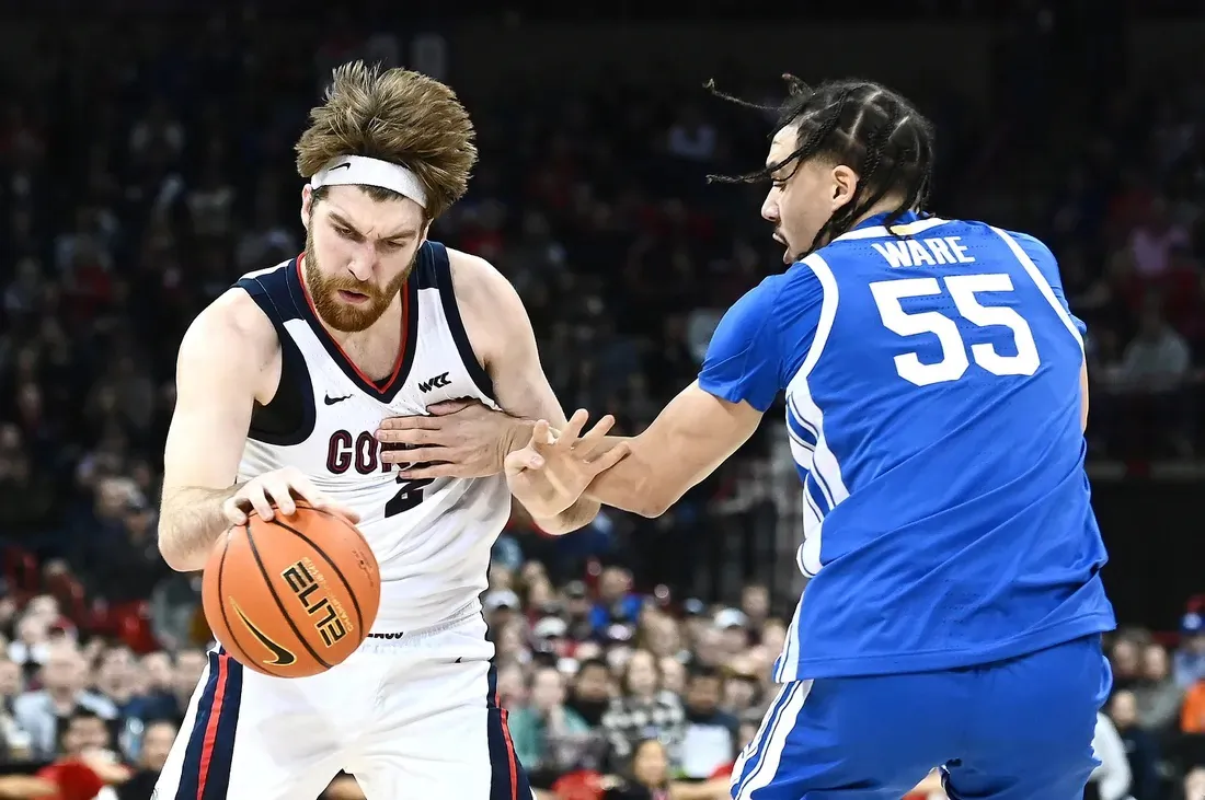 Gonzaga Bulldogs forward Drew Timme (2) is fouled on the drive by Kentucky Wildcats forward Lance Ware (55) in the first half at Spokane Arena in Washington on Nov 20, 2022. (James Snook-USA TODAY Sports via Field Level Media)