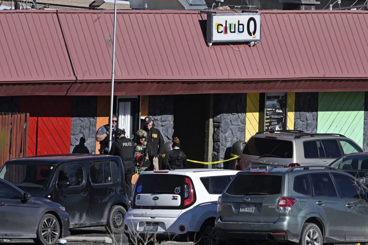 Colorado Springs police, the FBI, and others investigate the scene of a shooting at Club Q in Colorado Springs, Colo., on Nov. 20, 2022. (Helen H. Richardson/The Denver Post via AP)