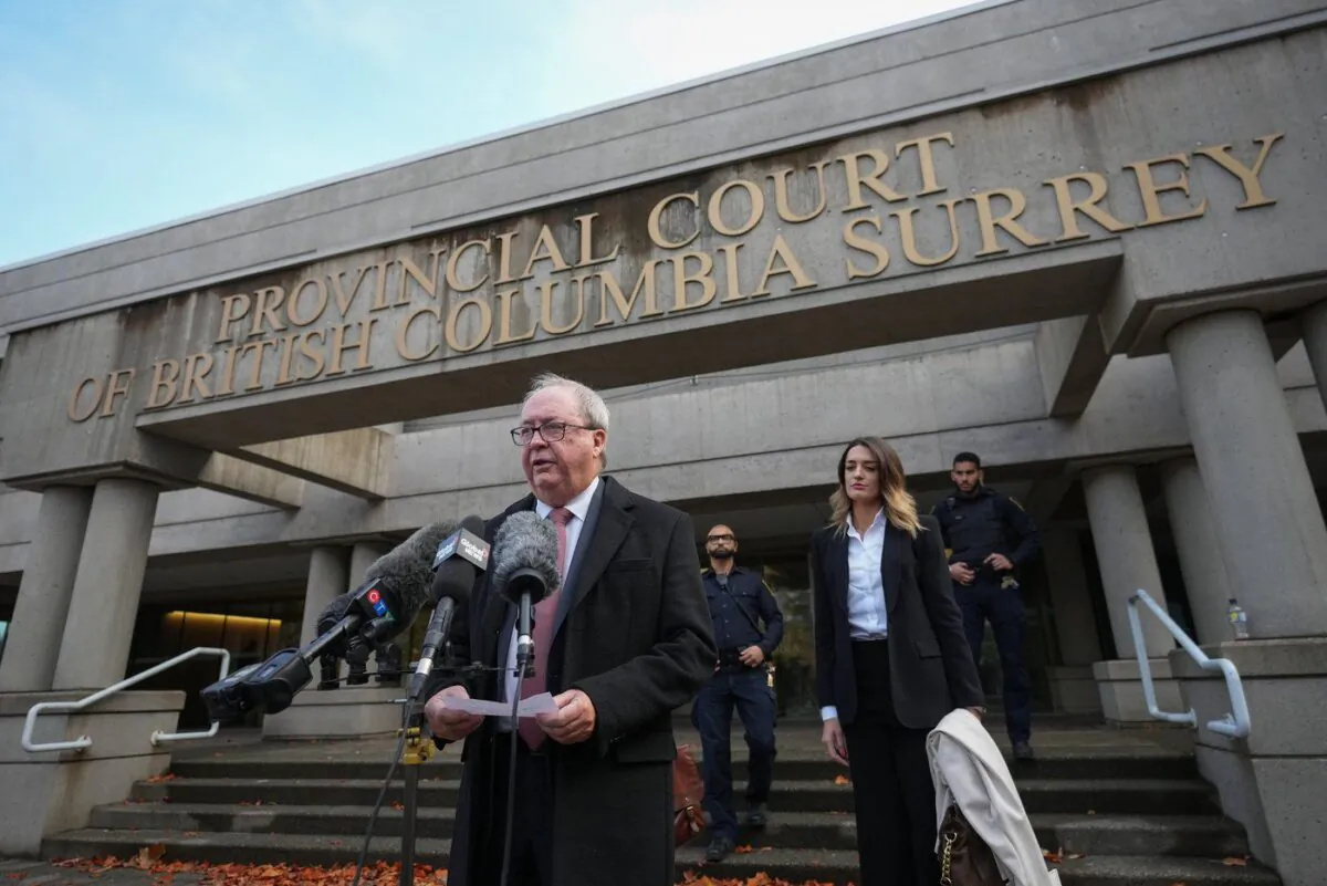 Former Surrey mayor Doug McCallum reads a brief statement outside provincial court after being found not guilty of public mischief, in Surrey, B.C., on Nov. 21, 2022. (The Canadian Press/Darryl Dyck)
