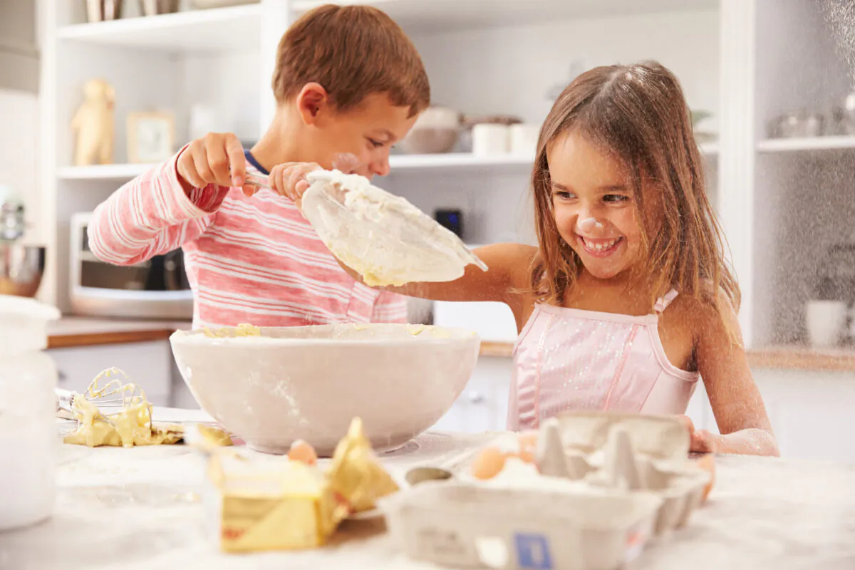 Baking treats lends itself perfectly to holiday homeschooling by incorporating lessons in self-sufficiency, math, chemistry, and art while grounding the season in family and tradition. (Monkey Business Images/Shutterstock)