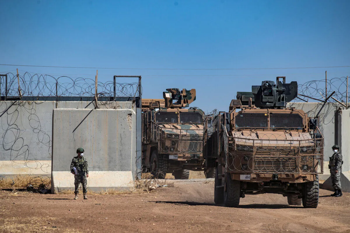 Turkish military vehicles enter Syria to take part in a joint patrol with Russian troops, in the countryside of the town of Derbassiye in Syria's northeastern Hasakeh province, on the border with Turkey, on July 14, 2021. (Photo by Delil SOULEIMAN / AFP) (Photo by DELIL SOULEIMAN/AFP via Getty Images)