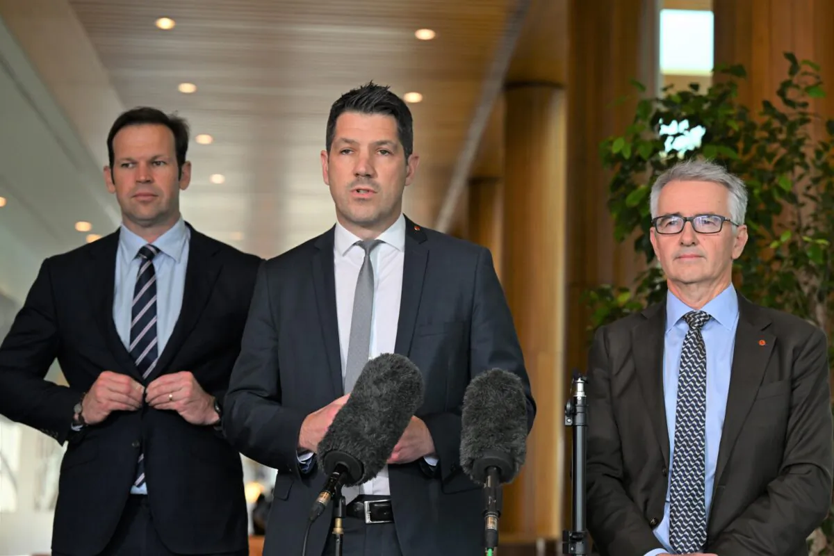 Nationals Senator Matt Canavan (R), Liberal Senator Alex Antic (C) and Liberal Senator Gerard Rennick (L) at a press conference at Parliament House in Canberra, Australia on Nov. 21, 2022. (AAP Image/Mick Tsikas)
