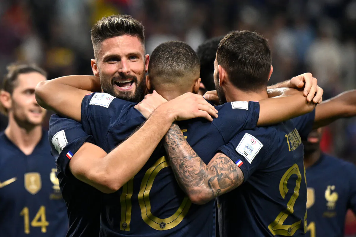 Olivier Giroud of France celebrates with teammates after scoring their team's fourth goal during the FIFA World Cup Qatar 2022 Group D match between France and Australia at Al Janoub Stadium in Al Wakrah, Qatar, on Nov. 22, 2022. (Clive Mason/Getty Images)