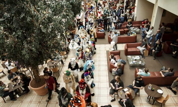Furries walk in the Estrel hotel lobby after a march on the second day of the 2016 Eurofurence furry gathering on Aug. 18, 2016, in Berlin, Germany.  (Carsten Koall/Getty Images)