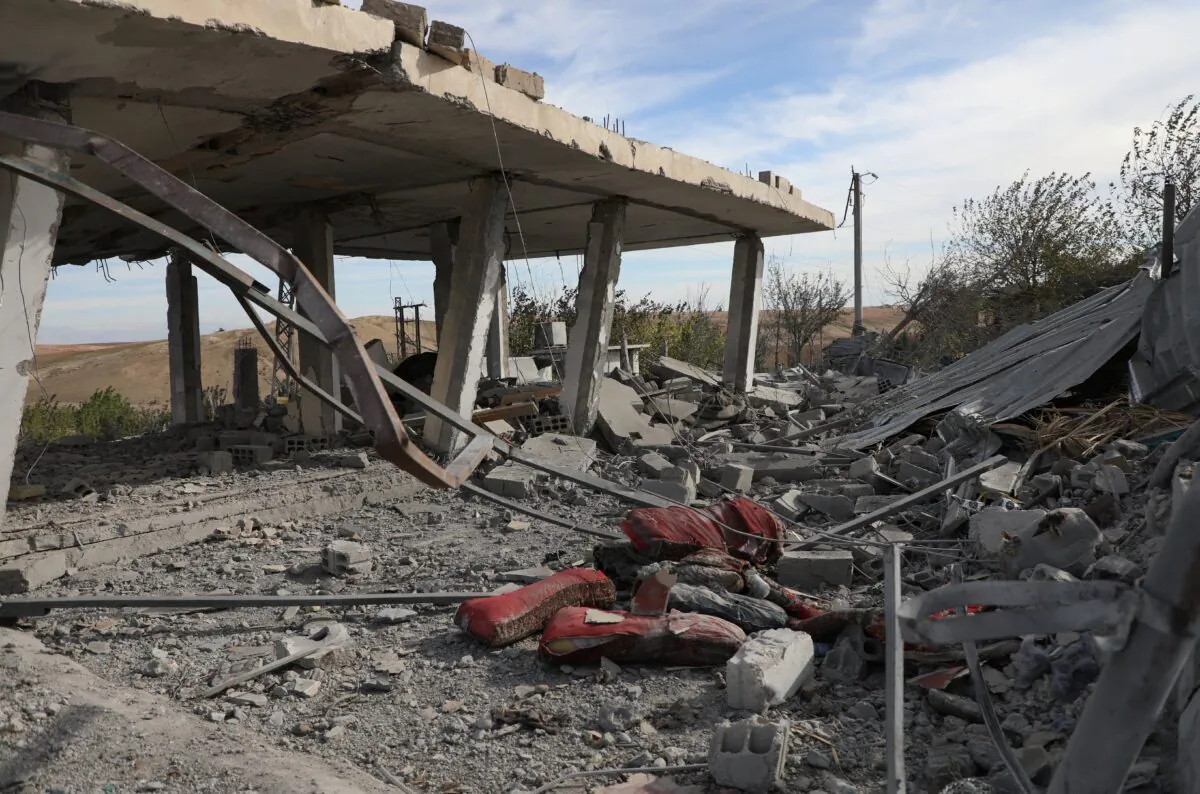 The aftermath after Turkish warplanes carried out air strikes, in Derik countryside, Syria, on Nov. 21, 2022. (Orhan Qereman/Reuters)