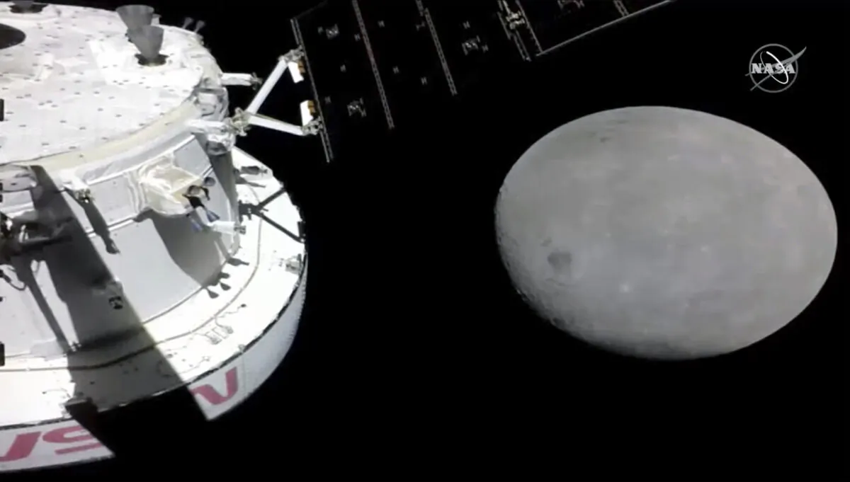 This handout from NASA TV shows NASA's Orion spacecraft approaching the moon on Nov. 21, 2022. (NASA via AP)