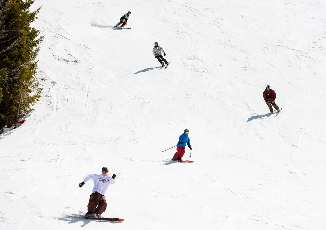 People ski and snowboard on the last day of the season at Bogus Basin in April. The resort reopened on Nov. 19, 2028. (Sarah A. Miller/Idaho Statesman/TNS)