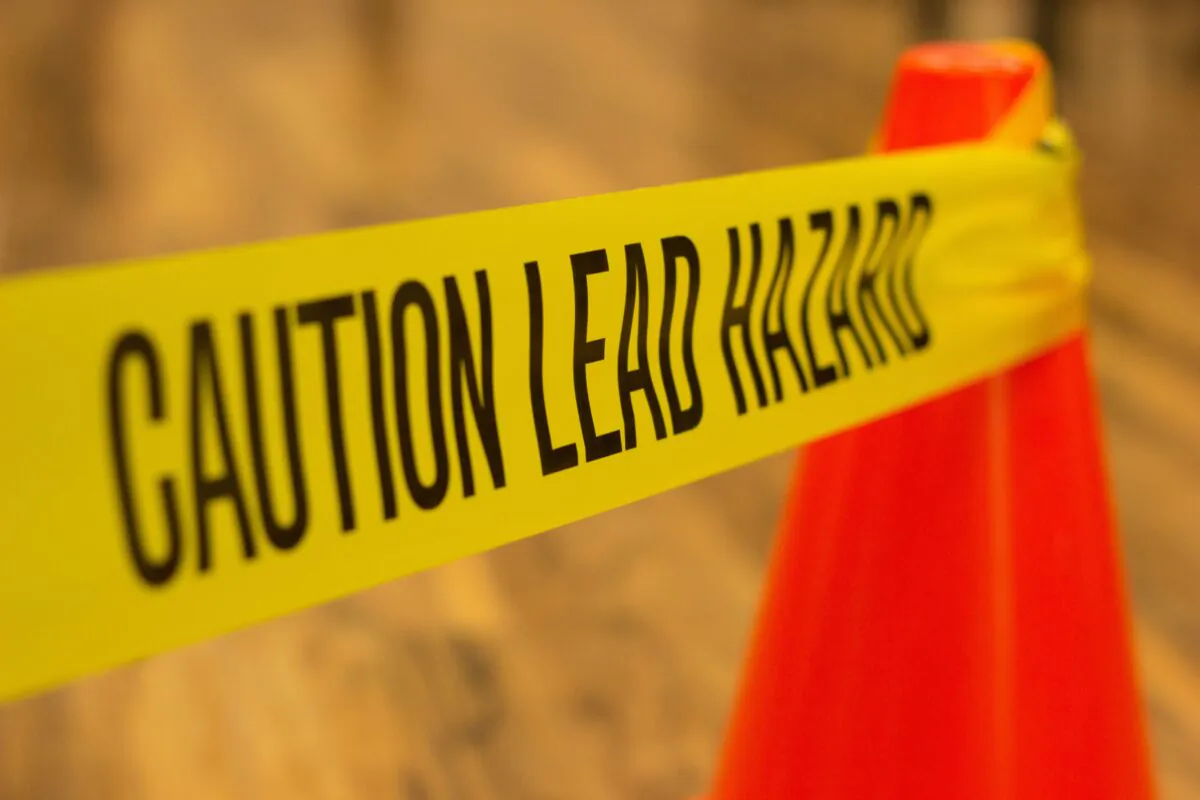 Lead-based paint, asbestos, underground storage tanks, and water tainted with lead area all risks to be careful about and transparent with when buying or selling a home. (D_Townsend/Shutterstock)